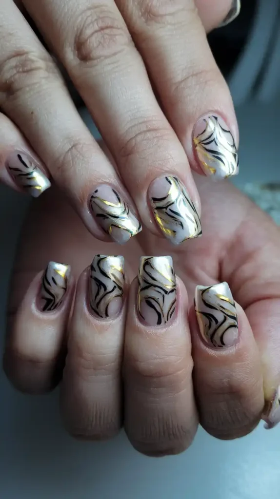 17 Unique New Year’s Eve Nail Ideas That’ll Make Your Manicure Sparkle